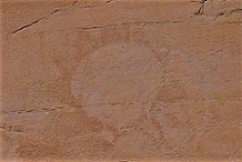 pictograph Sun painted with red ochre on sandstone