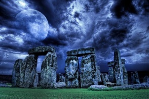  Stonehenge at night with a full moon in the sky 